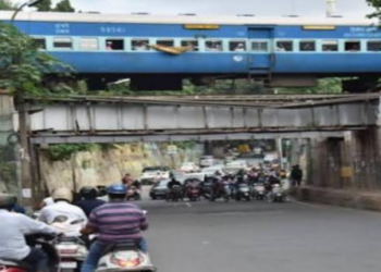 two-wheeler riders stop at the railway station instead of the railway underpass